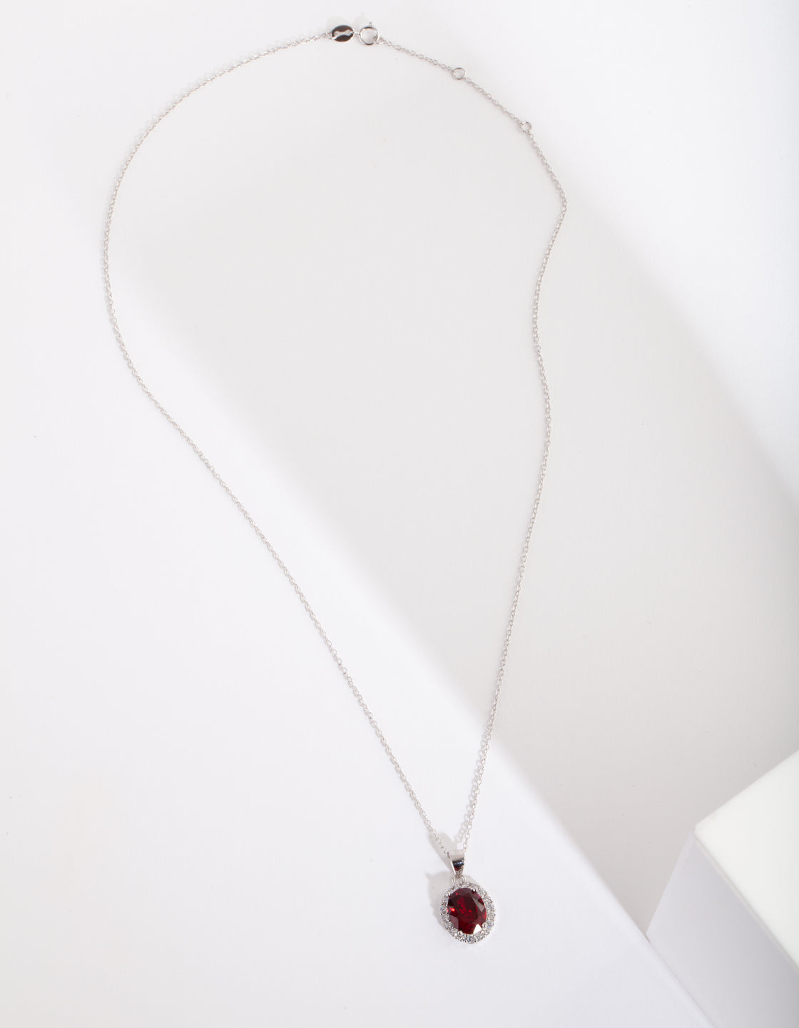 CG ST RH RUBY OVL HALO NL