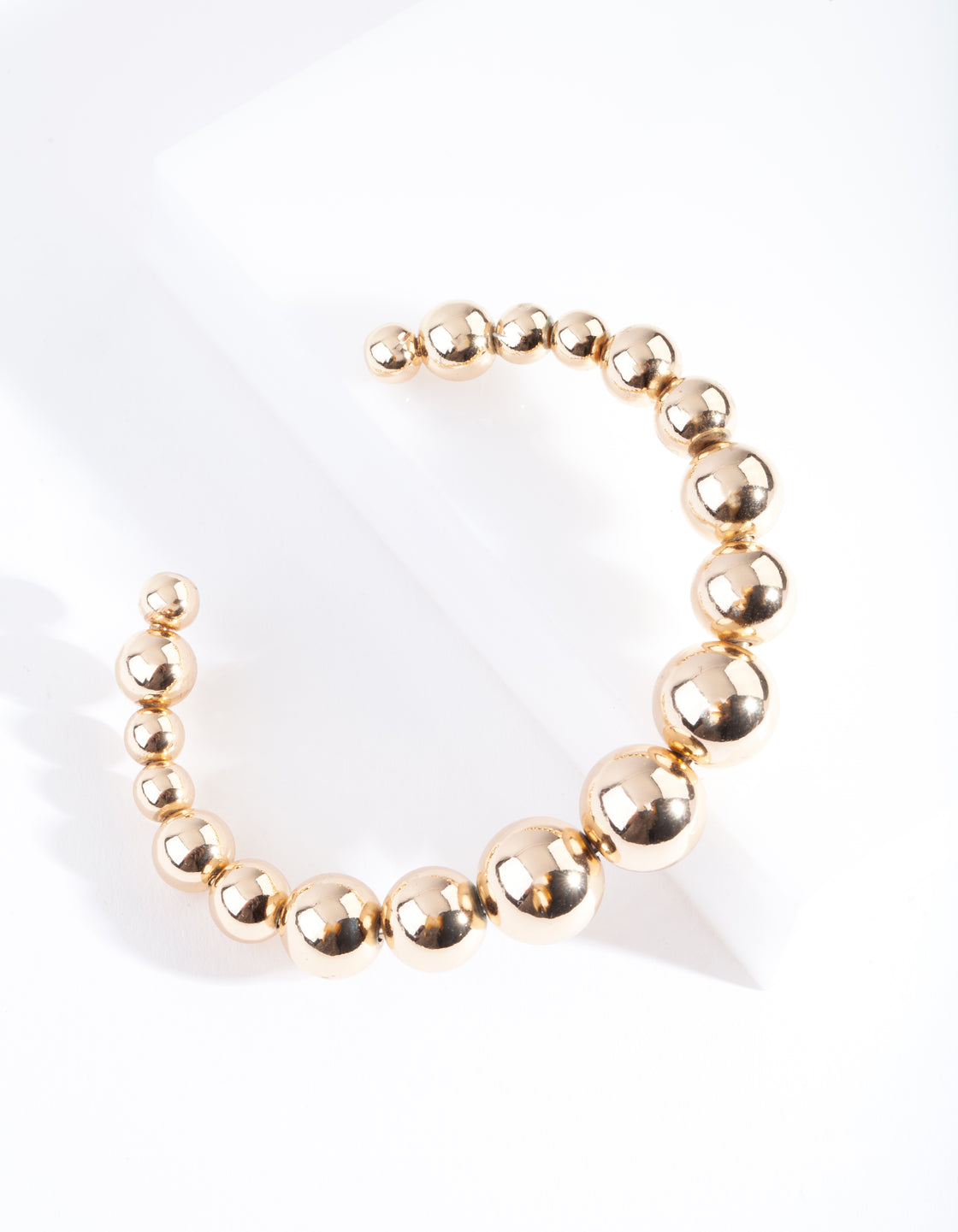 Gold Graduating Ball Cuff Bangle