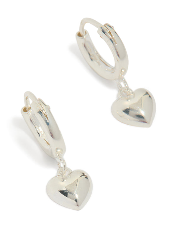 Featuring sterling silver chubby heart hoop earrings front view