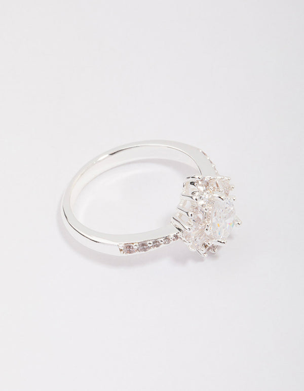 Showcasing a silver plated regal pear ring with stone cut detail front view
