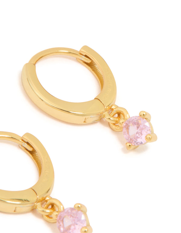 Highlighting the gold plated sterling silver pink cubic zirconia hoop earrings with closure post detail view