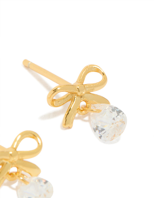 Beautifully crafted these statement style bow earrings with pear cut crystal in gold plated sterling silver close up view