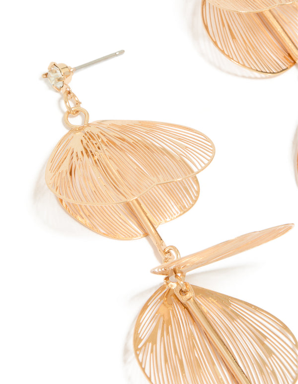 Featuring gold lazercut petal drop earrings with floral design close up view