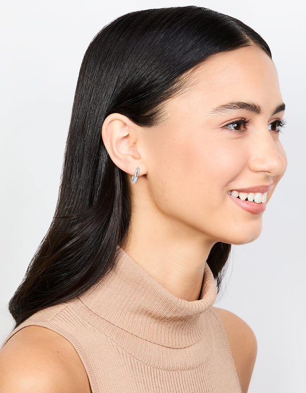 Designed with waterproof stainless steel clicker hoop earrings 16 MM in silver on model view