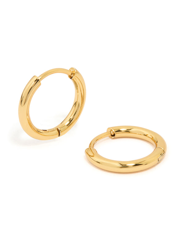 Showcasing waterproof gold plated stainless steel core clicker earrings 14 MM with huggie closure front view
