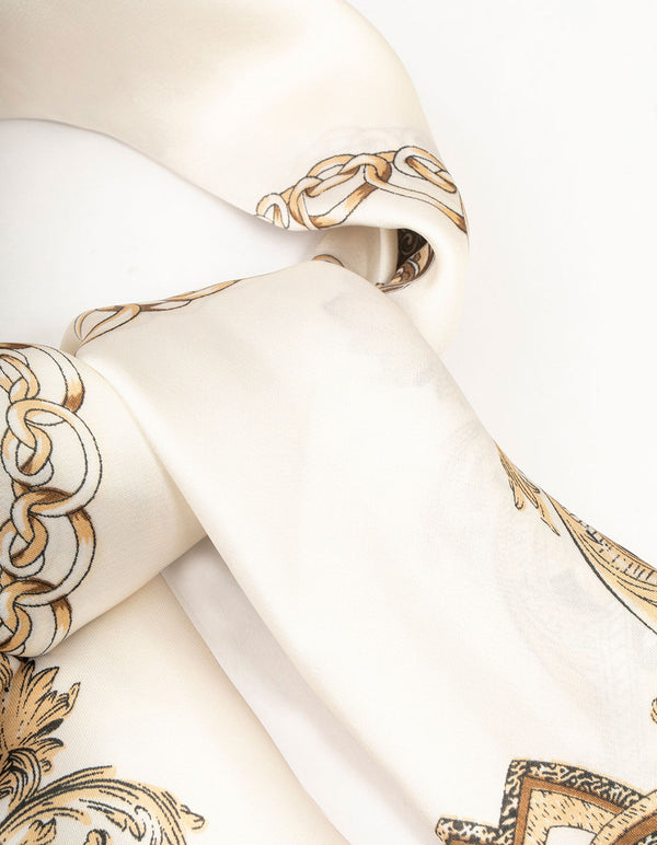 Crafted with leopard and chain fabric scarf featuring animal print in ivory, tan, black side view