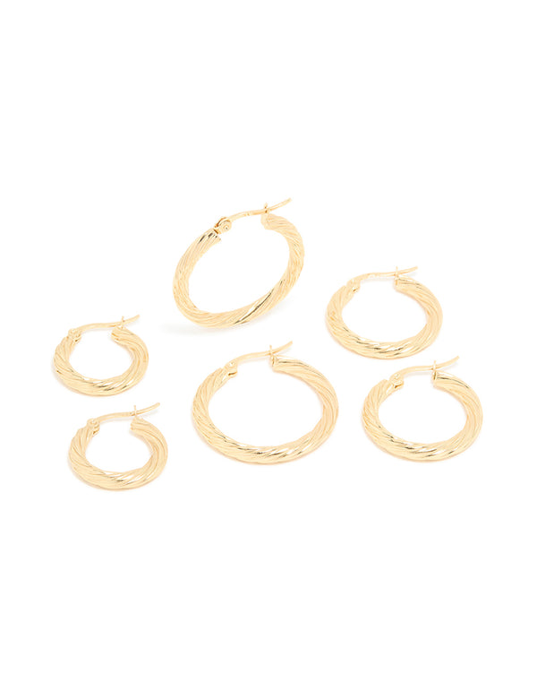 Featuring waterproof stainless steel twisted hoop earrings in a 3-pack with gold plating front view