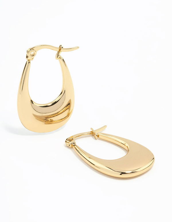 Showcasing waterproof elongated flat hoop earrings in gold plated stainless steel front view