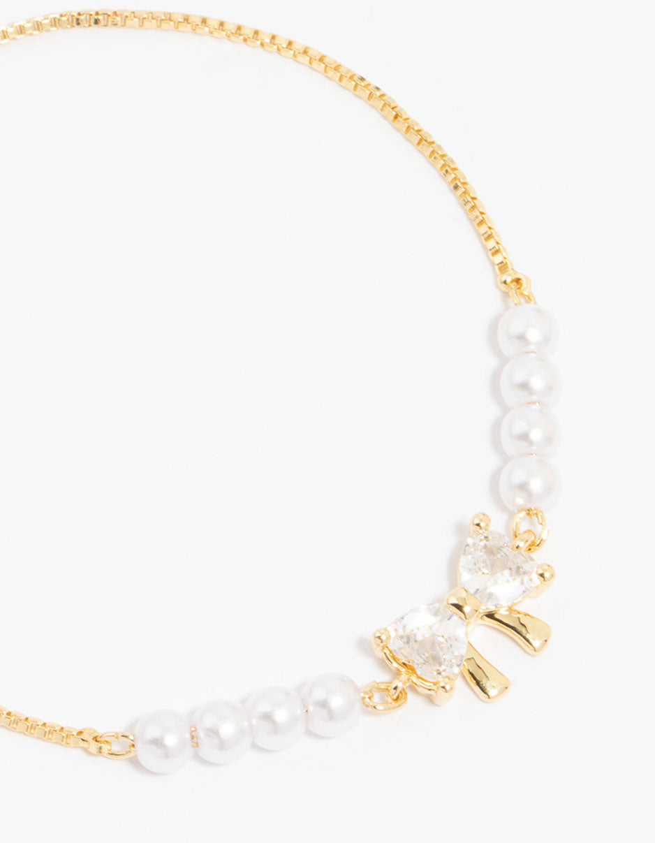 Gold Plated Cubic Zirconia Bow & Pearl Toggle Bracelet