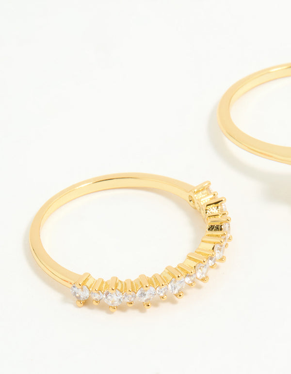 Showcasing gold plated cubic zirconia oval stacking rings in a 3-pack close up view