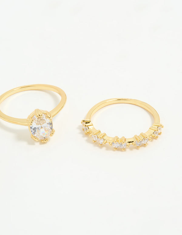 Displaying gold plated cubic zirconia oval stacking rings in a 3-pack side detail view