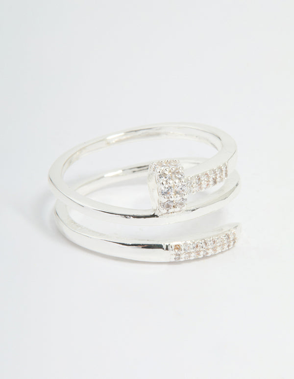 Crafted from silver plated metal, this nail wrap ring features cubic zirconia stones in a statement style front view