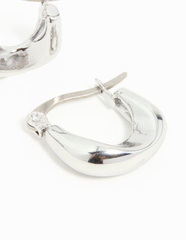 Detailed view of waterproof gold plated stainless steel organic twisted hoop earrings in silver post detail view