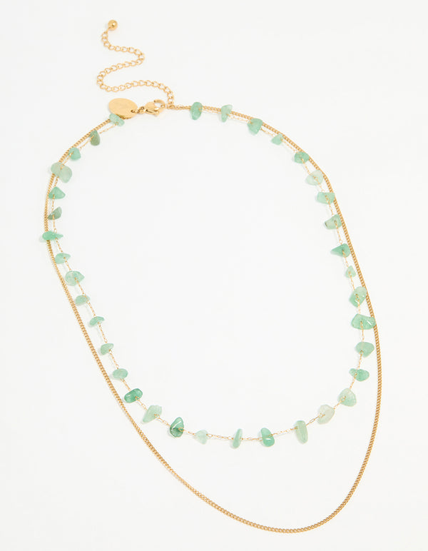 Crafted from waterproof stainless steel, this gold plated layered necklace features green stone beads accents front view