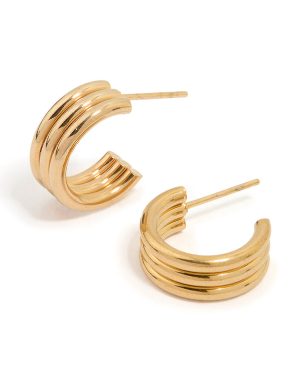 Featuring waterproof gold plated stainless steel fluted hoop earrings in gold front view