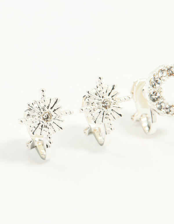Explore silver star and moon clip-on earrings 4-pack with celestial designs in clear close up view