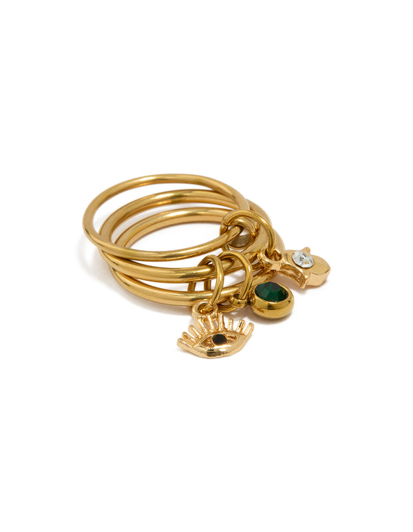 Showcasing a waterproof gold plated stainless steel evil eye and hamsa hand charm stacked ring in forest green and clear accents front view
