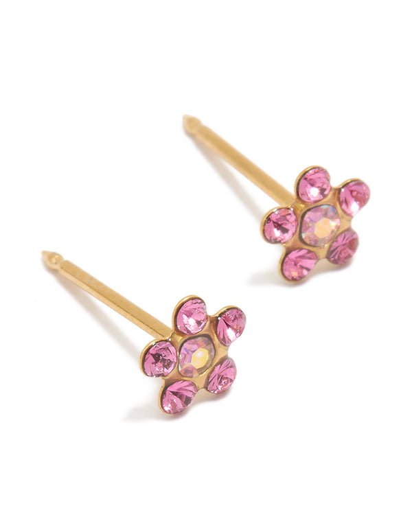 Discover these charming floral stud earrings crafted from 24K gold plated surgical stainless steel featuring pink cubic zirconia in a daisy design front view