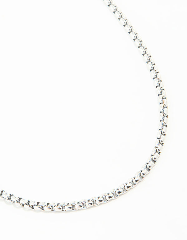 Showcasing a waterproof stainless steel round box chain short necklace in silver close up view