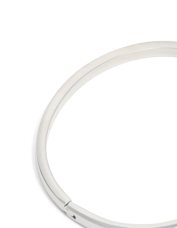 Elegant waterproof stainless steel smooth hinge bangle in silver with statement styling close up view