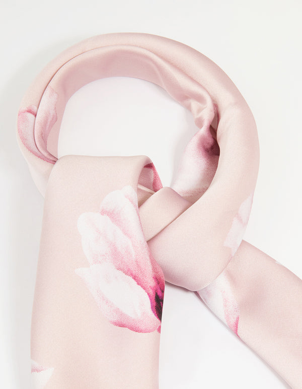 Beautifully designed fabric scarf in light pink with flower border showcasing white floral pattern side view