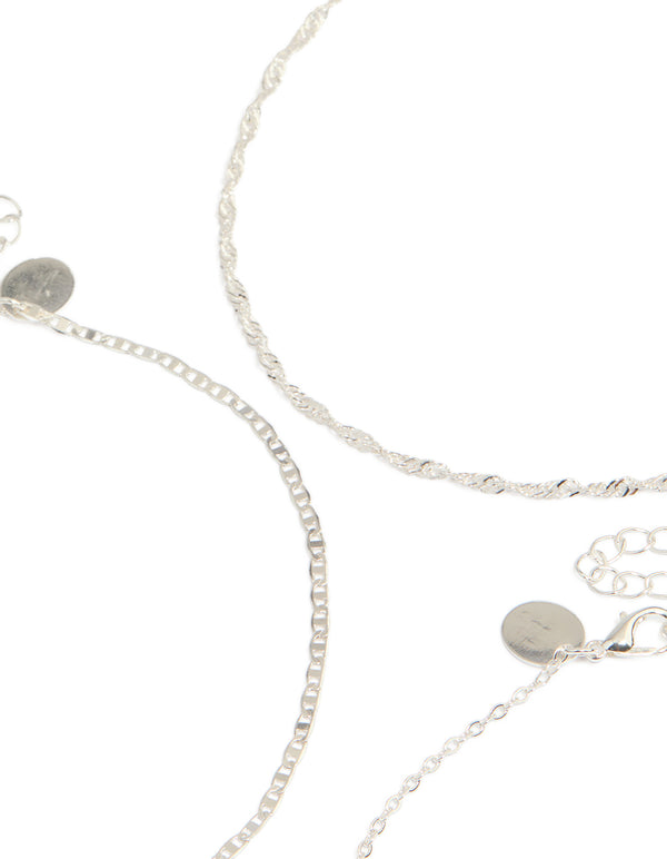Designed with a silver celestial choker necklace 6-pack featuring moon, star and ball accents clasp detail view