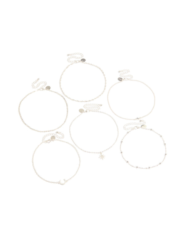 Featuring a silver celestial choker necklace 6-pack with balls, moon and star accents front view