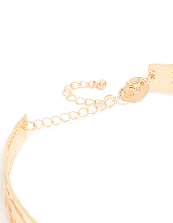 Highlighting the gold choker layered necklace clasp detail view