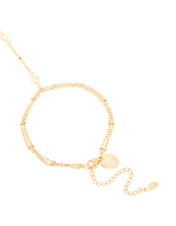 Designed with waterproof gold plated stainless steel, cubic zirconia with gold beads in dainty style in closure detail view