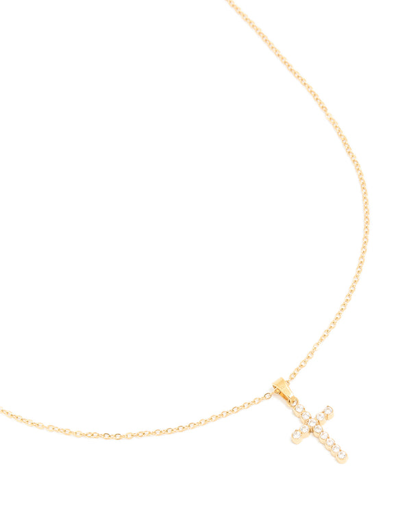 Showcasing a waterproof cross pendant necklace in gold plated stainless steel with cubic zirconia on neck view