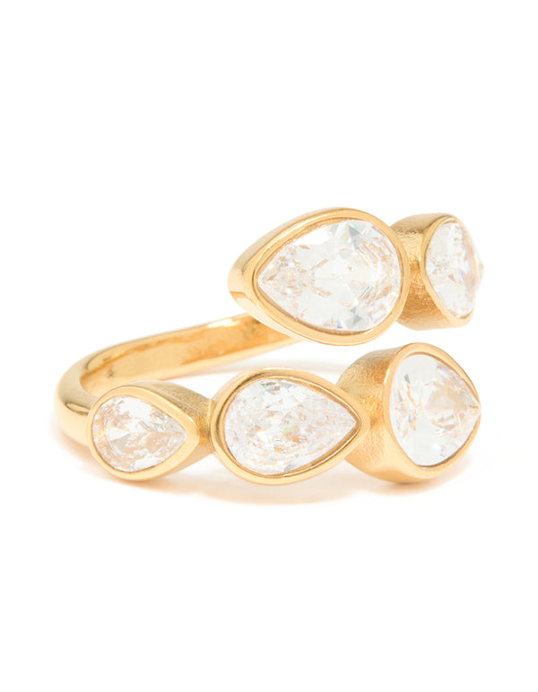 Crafted from waterproof gold plated stainless steel with pear cut cubic zirconia in clear accent, designed as a wrap ring close up view