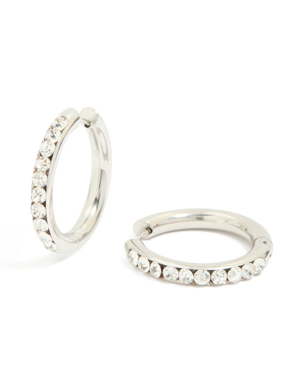 Showcasing waterproof stainless steel half diamante hinge hoop earrings crafted from silver in clear stone front view