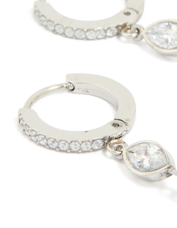 Detailed waterproof stainless steel cubic zirconia huggie drop earrings in silver and clear stone close up view