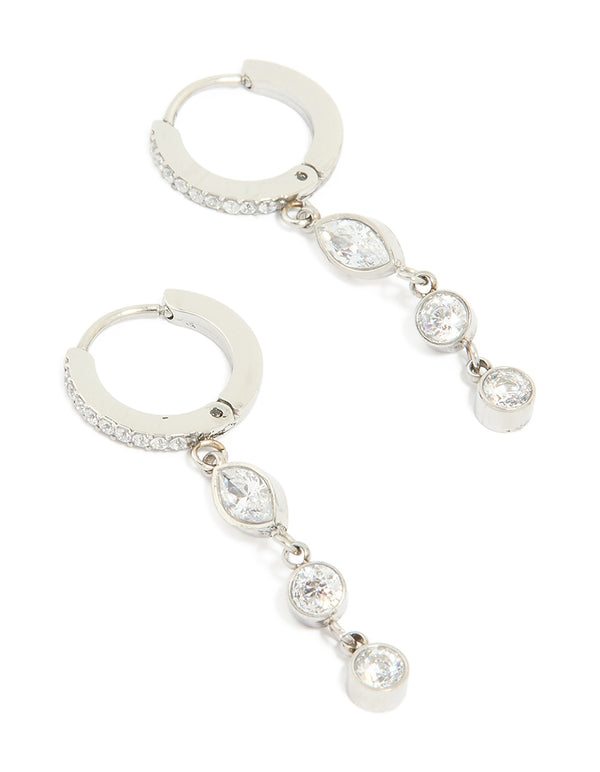 Showcasing waterproof stainless steel cubic zirconia huggie drop earrings in silver and clear stone front view