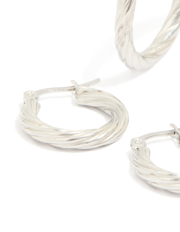 Highlighting waterproof stainless steel twisted hoop earrings in a 3-pack with silver finish close up view