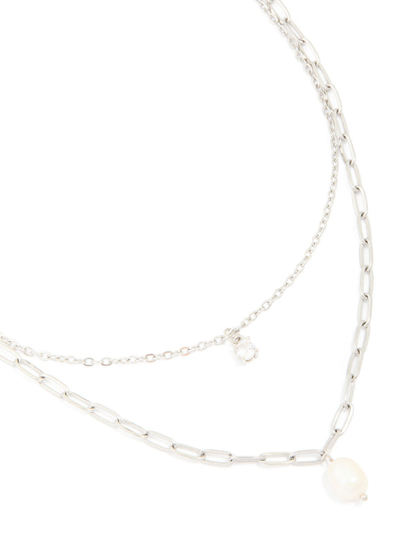 Discover a waterproof stainless steel diamante and freshwater pearl chain layered necklace in silver ivory on neck view
