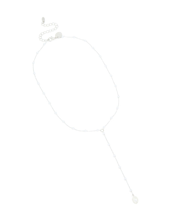 Designed with waterproof stainless steel featuring pearl accents in silver and white front view