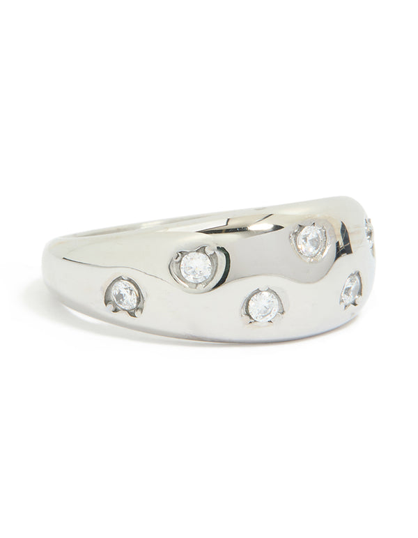 Showcasing a waterproof stainless steel spotty diamante band ring crafted from silver with clear accents front view