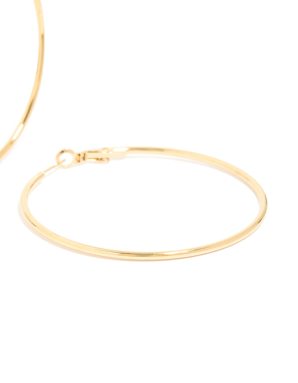 Designed with waterproof gold plated stainless steel hoop earrings in 55 MM size post detail view