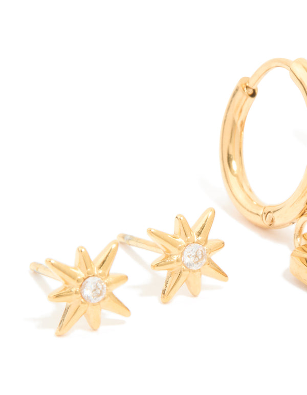 Designed waterproof gold plated stainless steel cubic zirconia star disc and huggie earrings in a 3-pack with celestial accents close up view