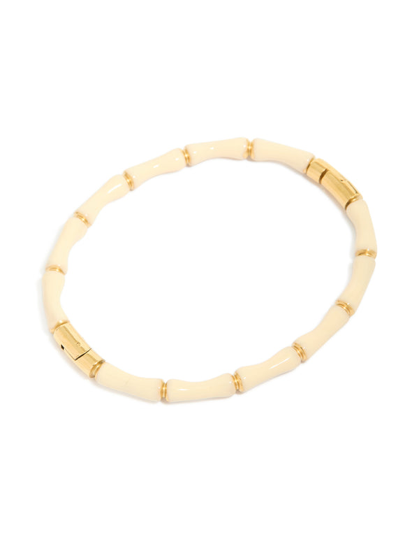 Beautifully designed waterproof bamboo white enamel bangle in gold plated stainless steel with ivory tones front view