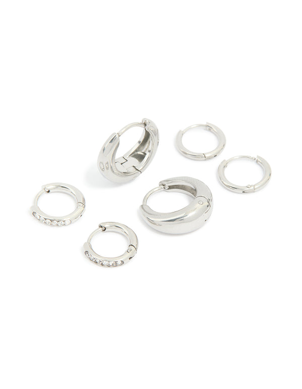 Presenting a waterproof stainless steel cubic zirconia mix huggie earrings 3-pack with silver finish and clear tones front view
