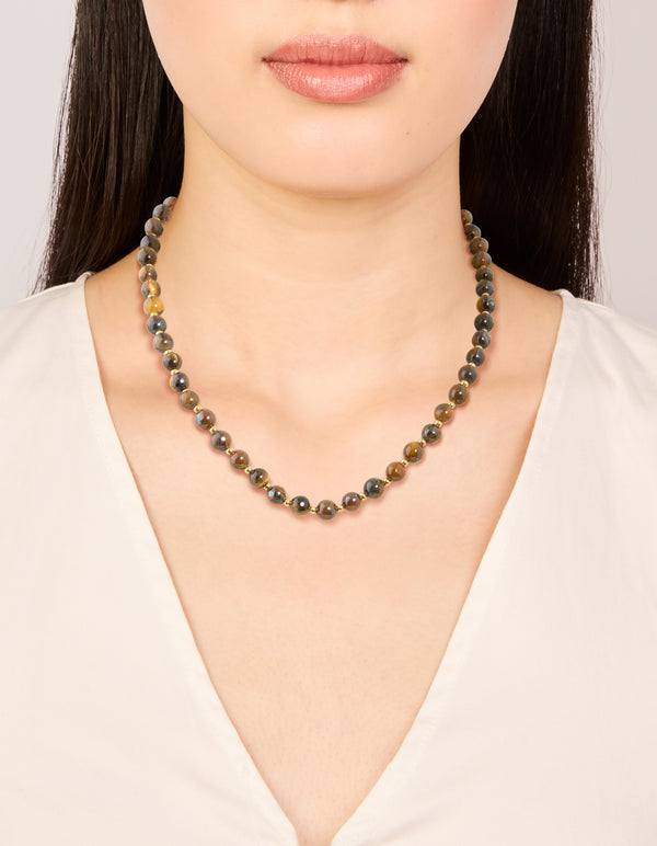 Featuring a waterproof beaded tigers eye semi precious stone short necklace in gold plated stainless steel on neck view