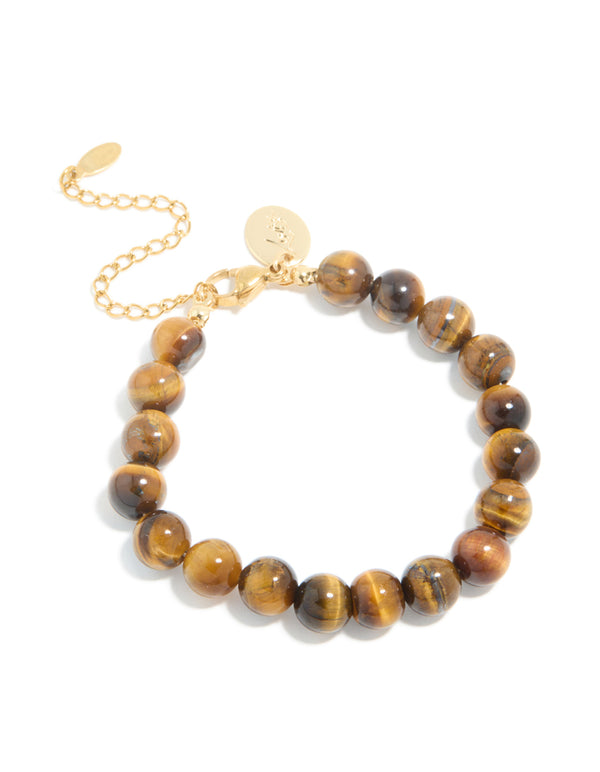 Showcasing a beaded bracelet crafted from waterproof gold plated stainless steel with tigers eye semi precious stone in gold front view