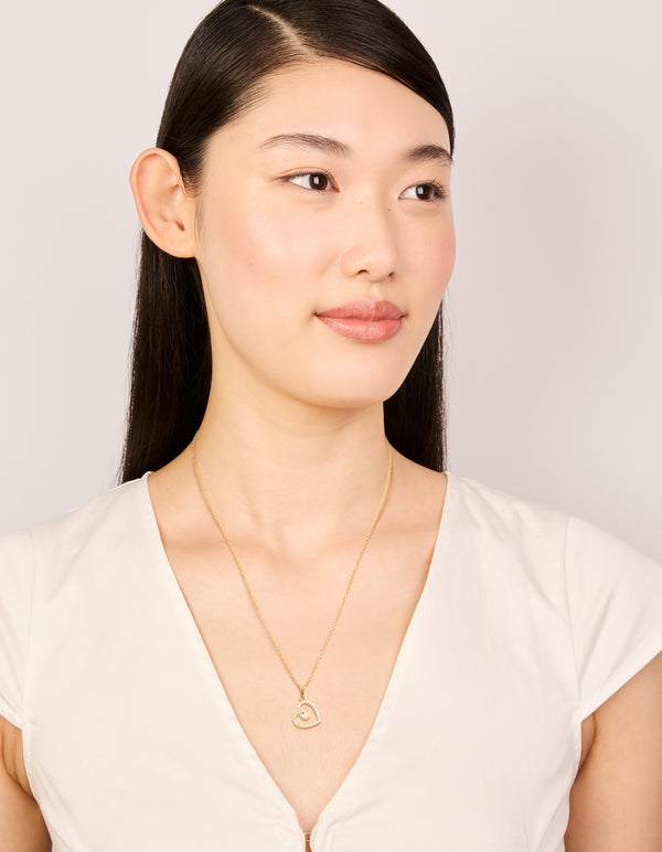 Beautifully designed waterproof heart pendant dainty style necklace in gold plated stainless steel with cubic zirconia on model view