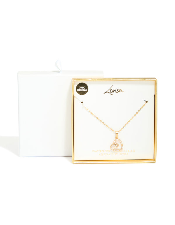 Elegant waterproof heart pendant necklace in gold plated stainless steel featuring cubic zirconia with dainty design close up view