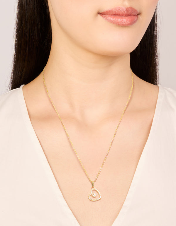 Showcasing a waterproof heart pendant necklace crafted from stainless steel with cubic zirconia in a dainty style on neck view
