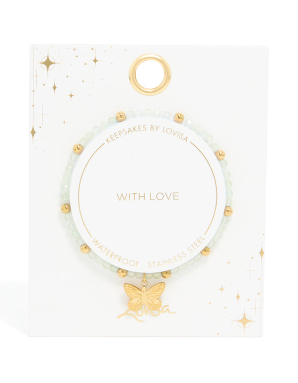 Crafted from waterproof gold plated stainless steel, this green semi precious stone butterfly stretch bracelet with beads closure detail view