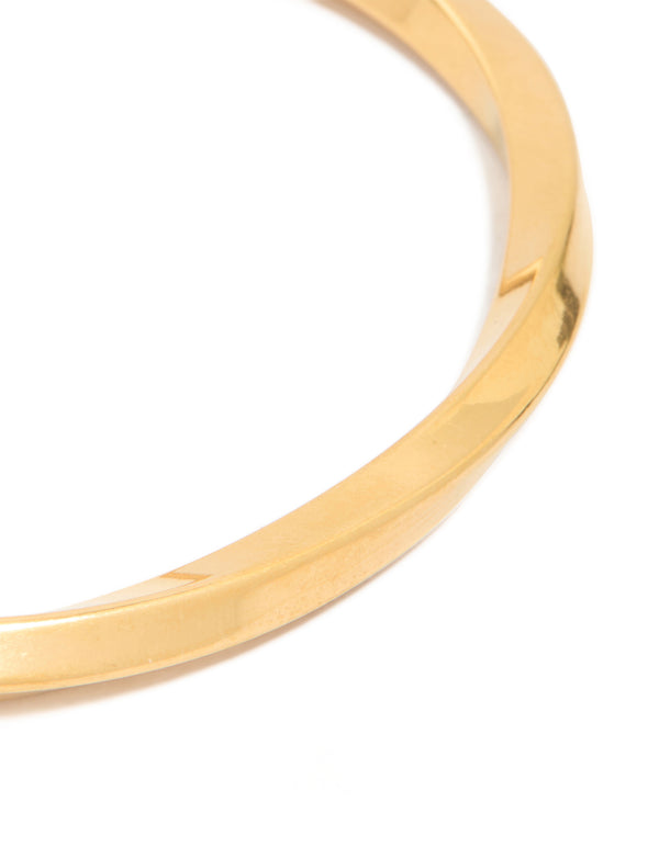 Featuring waterproof gold plated stainless steel square twist wrist cuff close up view