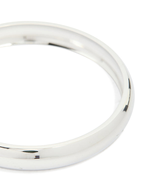 Featuring a waterproof stainless steel round smooth bangle in silver close up view
